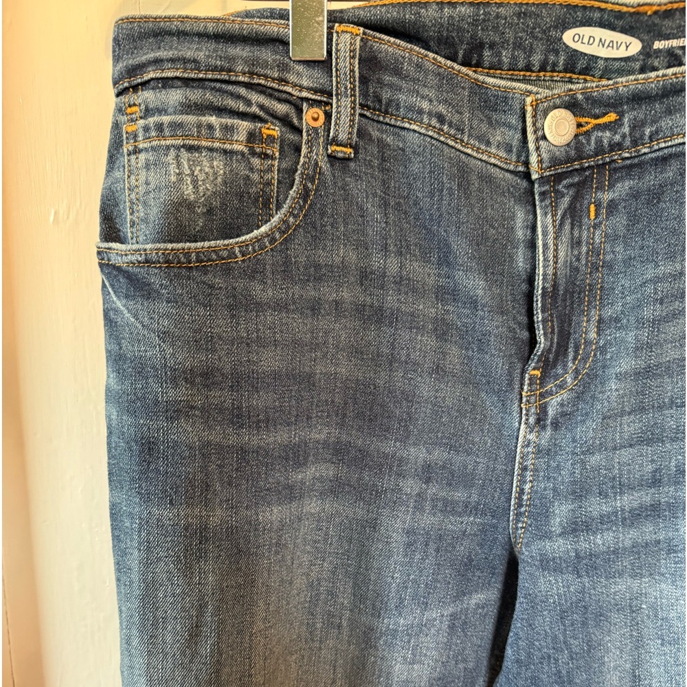 Cropped, raw hem, distressed boyfriend jean